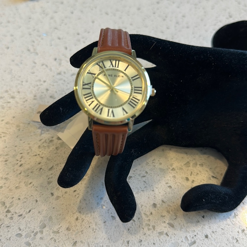 Anne Klein gold tone, watch with leather band